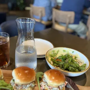 a plate of food and a glass of water
