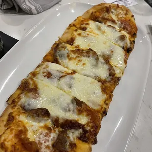 Flatbread with pepperoni + apple bacon + sausage  DELICIOUS with the Wagu Meatball Sauce