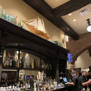 a bar with a lot of bottles