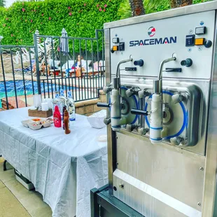 Double barrel margarita machine in action.