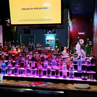 a bar full of liquor bottles