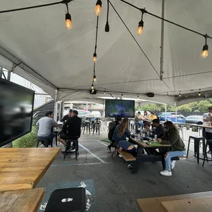 External patio area. Two TV's. Enter through the parking lot