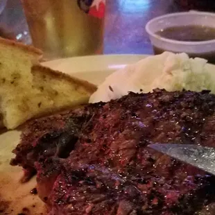 Thursday  Steak Night $15 with garlic mashed potatoes, mushroom gravy and a salad. Cooked medium rare with great flavor.