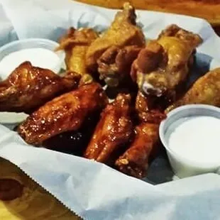 Wings w/ homemade sauce options.