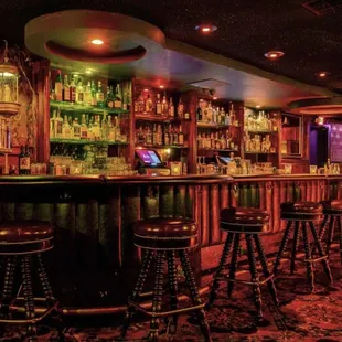 a bar with a lot of stools