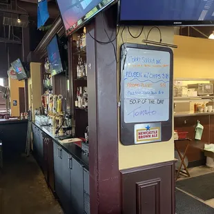 View of kitchen and bar. Clean. Nice place. Great staff.