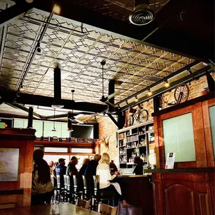 people sitting at the bar