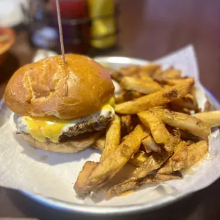 a cheeseburger and fries