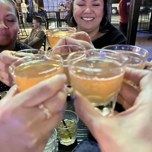 a group of people toasting