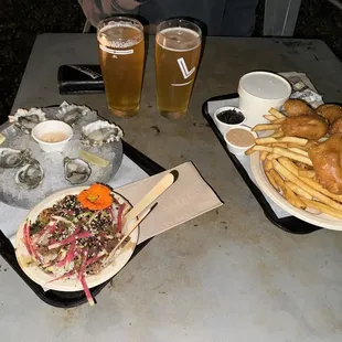 Oysters, razor clam chowder, non gmo oyster crackers fish and chips with all the sauces (black garlic was insanely good) and fresh poke