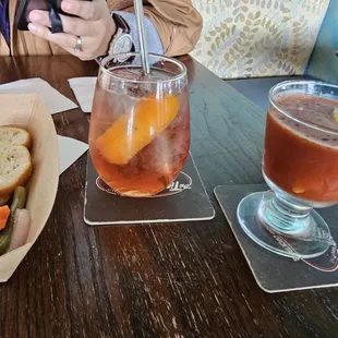 sour bourbon bitters and N/A aperol spritz
