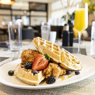 Chicken & Waffle
 
 buttermilk marinated breast, house made belgian waffle, honey house hot truffle honey