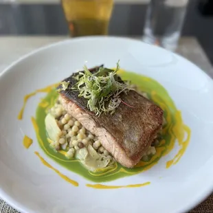 Pan seared salmon with pearl couscous.