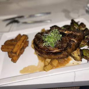 Pork chop with polenta fries and brussel sprouts