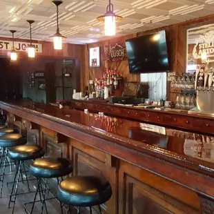 a bar with stools