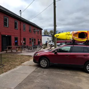 a car with a kayak on top