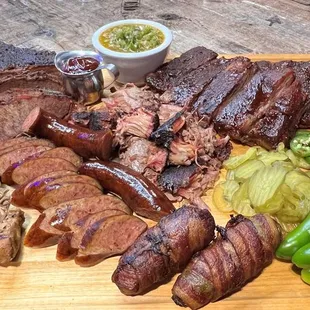 A variety of meats from our smoker. Brisket, Pulled Pork, Sausage, Tender Pork Ribs and smoked chicken.