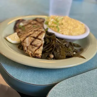 Grilled trout with grits and collard greens