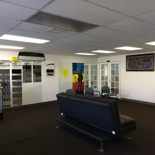 Enjoy our very comfortable  and spacious waiting room.While our technicians install high quality, American made window films.