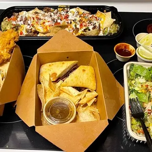 Tri tip sandwich loaded nachos flame grilled chicken salad