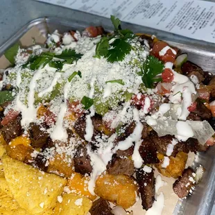 Tri tip loaded tater tots