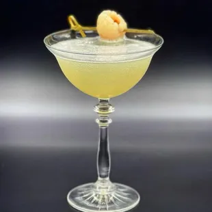 a cocktail in a coupe glass
