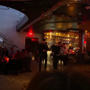 people sitting at a bar