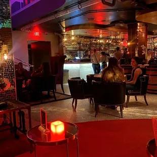 people sitting at a bar