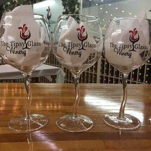 Custom made, hand blown, "tipsy" stem souvenir wine glasses $6.99.