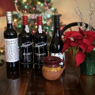 a variety of wine bottles on a table