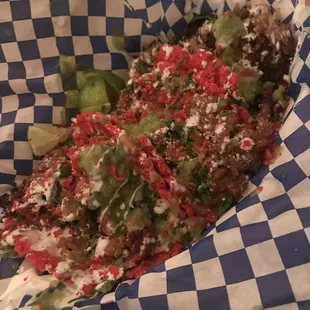 Fresh pressed tortillas with hot Cheetos!