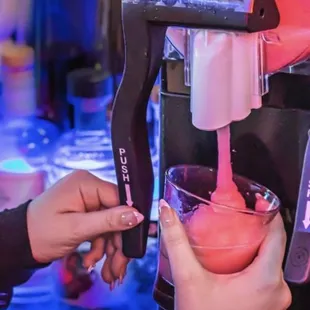 a person making a drink