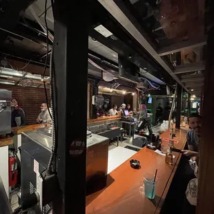 people sitting at the bar