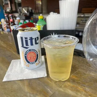 a drink and a can