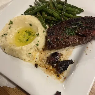 Angus steak, potatoes with butter garlic and green beans