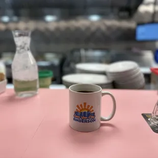 The bar in front of the kitchen at The Toast Cafe with a cupa wake me up juice.