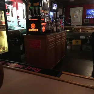 a bar with a mirror
