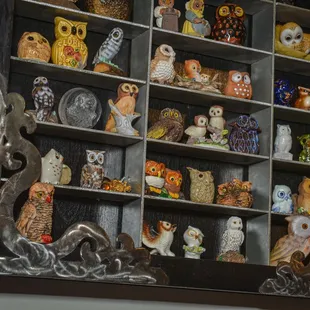 a display of owl figurines