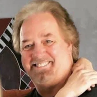 Ken T.