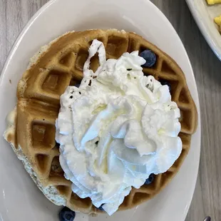 Belgian Waffle with whipped cream and blueberries