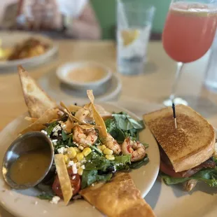 Lunch is brunch  BLT  and shrimp cilantro salad   Strawberry orange mimosa