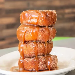 a stack of glazed donuts