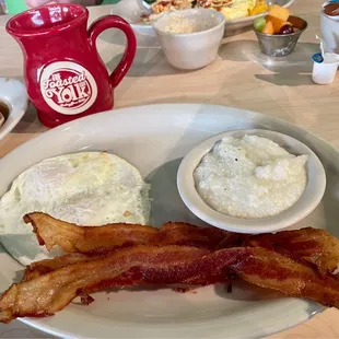 Two Eggs &amp; a Cake (eggs over medium, crispy bacon &amp; grits)