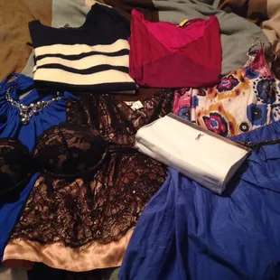 1 sweater, 3 (1 new with tags) shirts, 1 dress, 1 new with tags VS bra, and 1 Yves Saint Laurent bag $20.33! I love The Toggery!