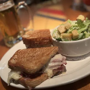 A Reuben with a side Caesar and a brew.