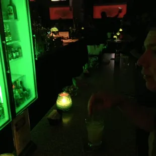 a man sitting at a bar