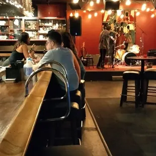people sitting at the bar