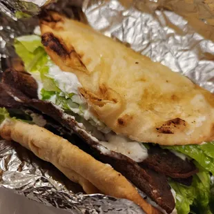 a sandwich wrapped in foil