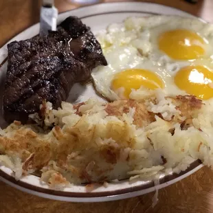 Top sirloin steak with eggs and hashbrown