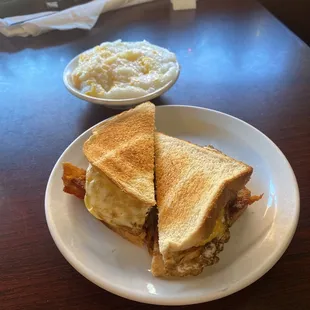 a breakfast sandwich and mashed potatoes